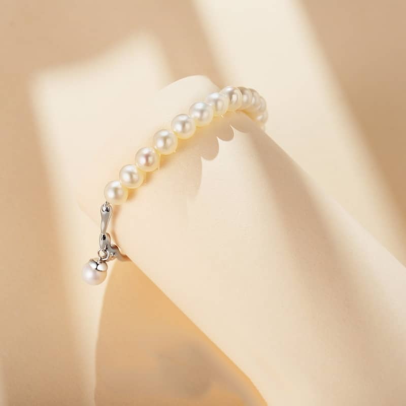 Freshwater Pearl and Silver Brach with a Pearl Charm Bracelet - Image 4